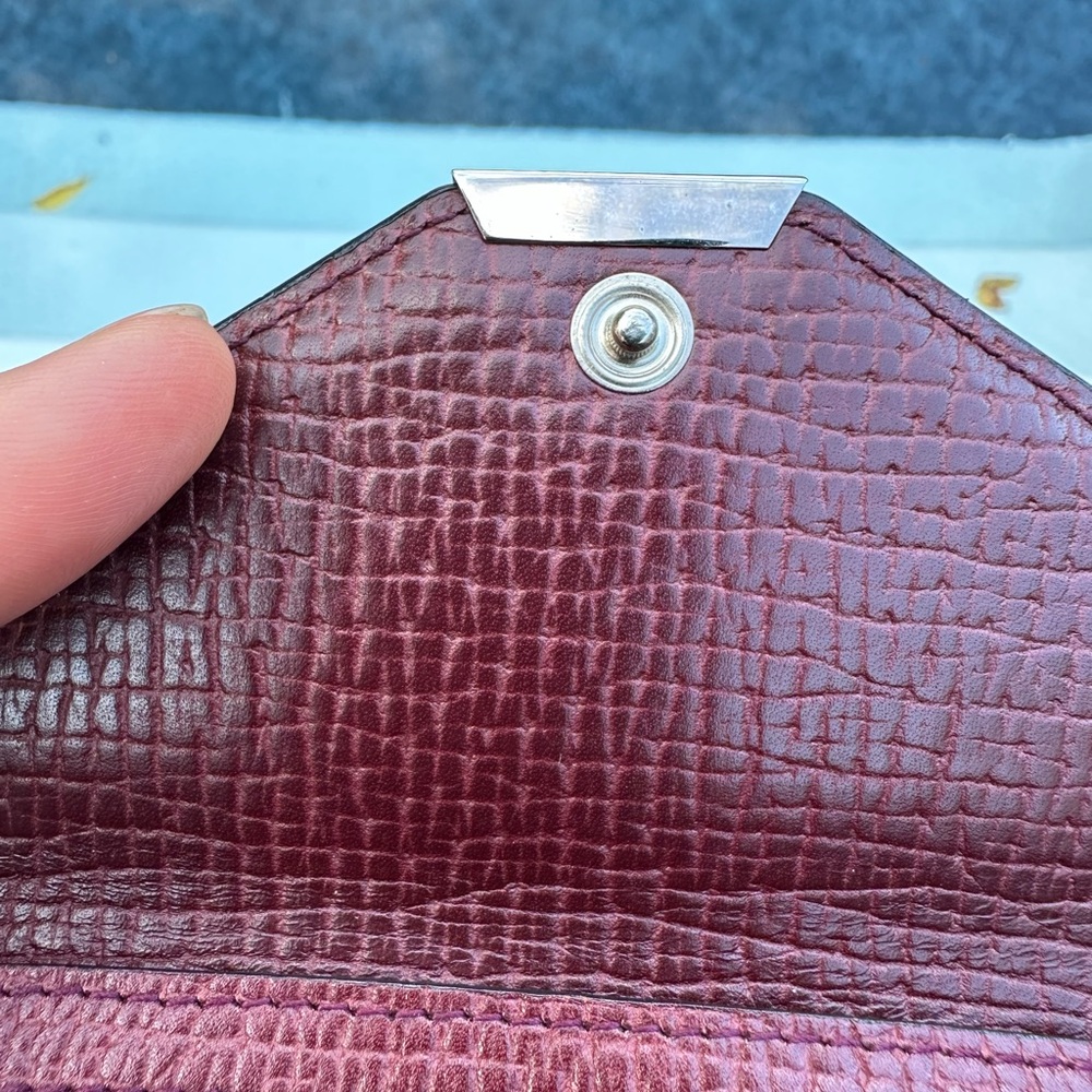 Loewe 🤍 Maroon Textured Leather Clutch - Picture 9 of 14